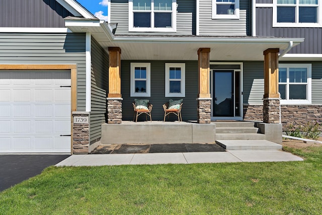 property entrance with stone siding, board and batten siding, covered porch, and an attached garage