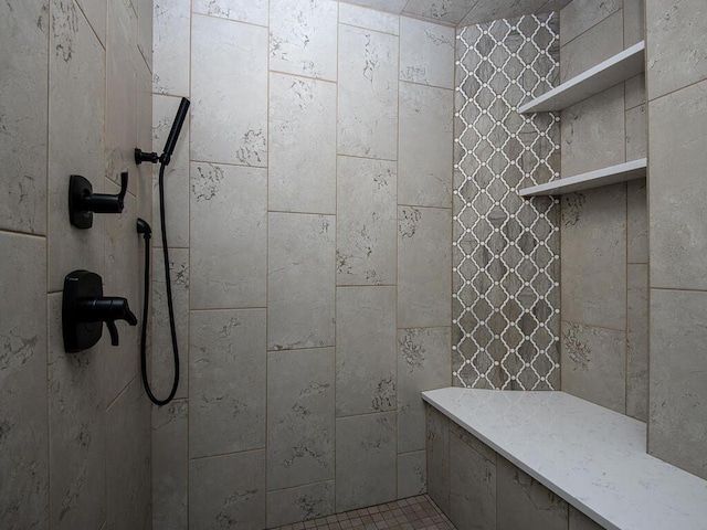 bathroom featuring tiled shower