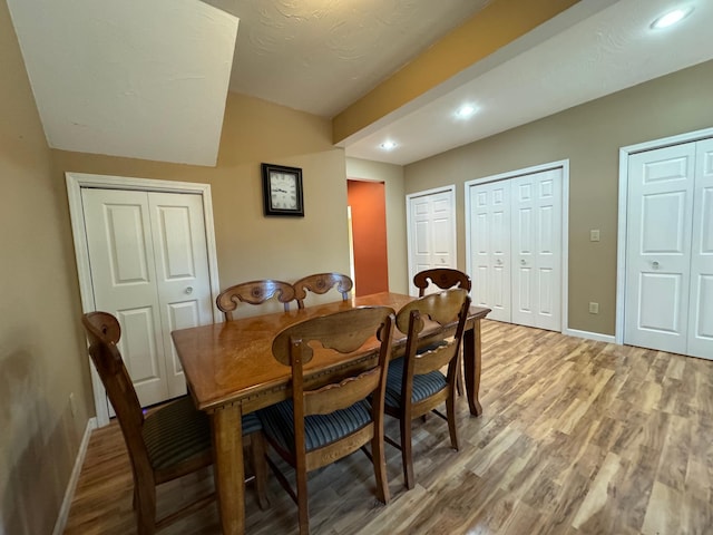 dining room featuring wood-type flooring