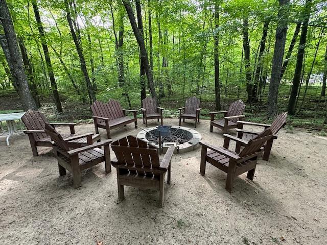 view of patio featuring a fire pit