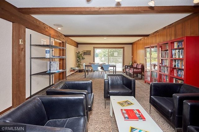 living room with beam ceiling and carpet flooring