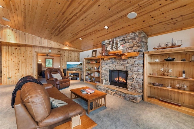 living area with carpet, a stone fireplace, wooden ceiling, and vaulted ceiling