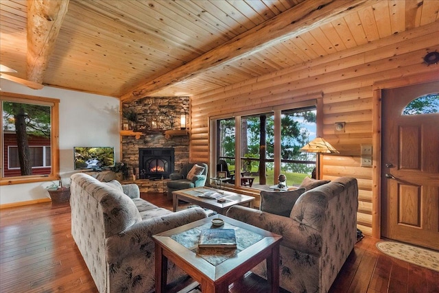 living area with wooden ceiling, beam ceiling, hardwood / wood-style floors, and a fireplace