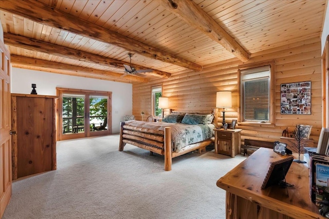 carpeted bedroom with beamed ceiling, wood ceiling, and log walls