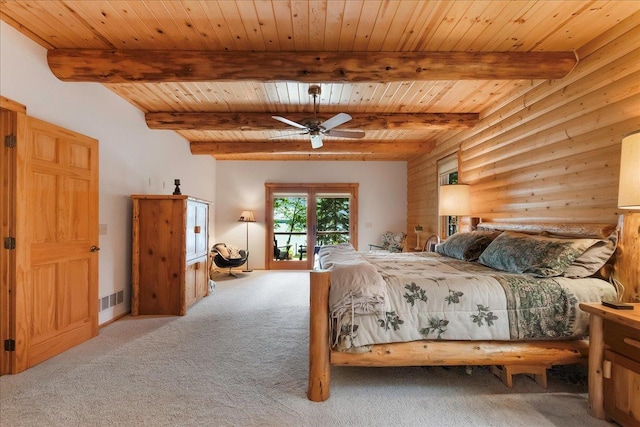 carpeted bedroom featuring beamed ceiling, visible vents, wooden ceiling, and access to exterior