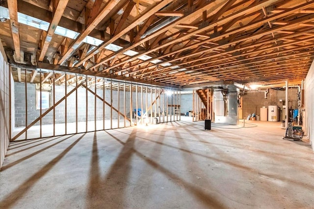 basement with heating unit and water heater