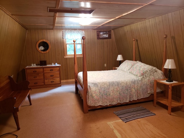 bedroom featuring wood walls