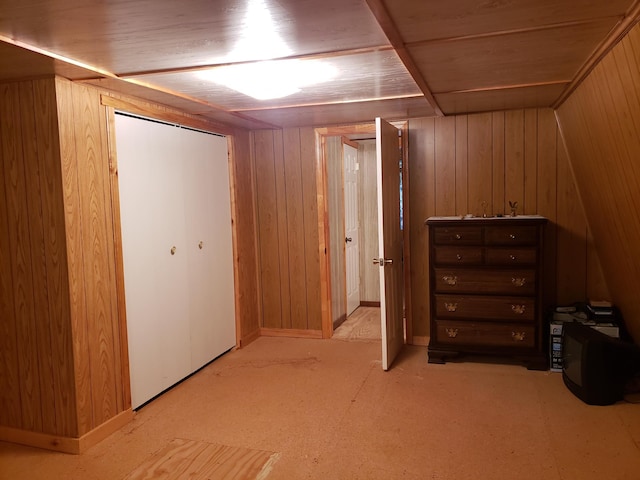 interior space featuring wooden walls