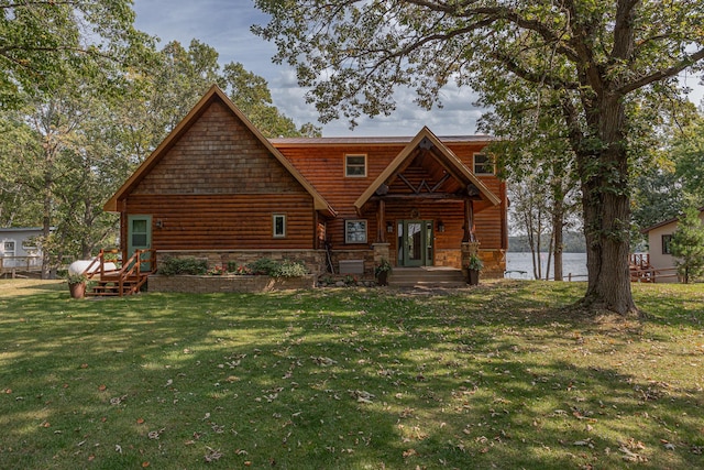 view of front of property with a water view and a front yard