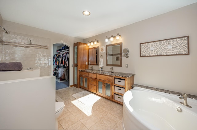 full bathroom featuring tile patterned flooring, vanity, toilet, and plus walk in shower