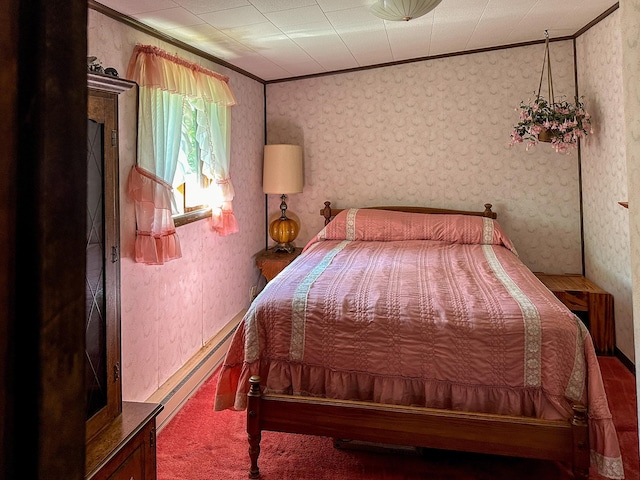 carpeted bedroom with a baseboard radiator and ornamental molding