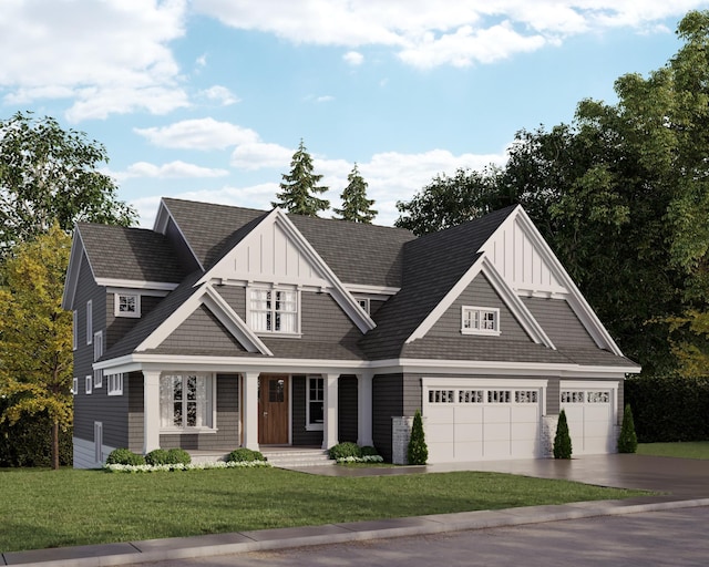 view of front of house with a garage, covered porch, and a front yard