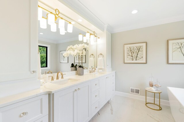 bathroom with a bath, crown molding, and vanity