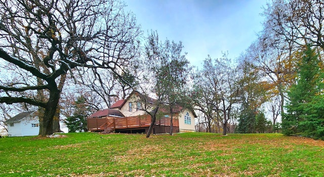 view of yard featuring a deck