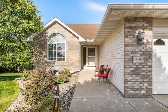 property entrance with a patio area