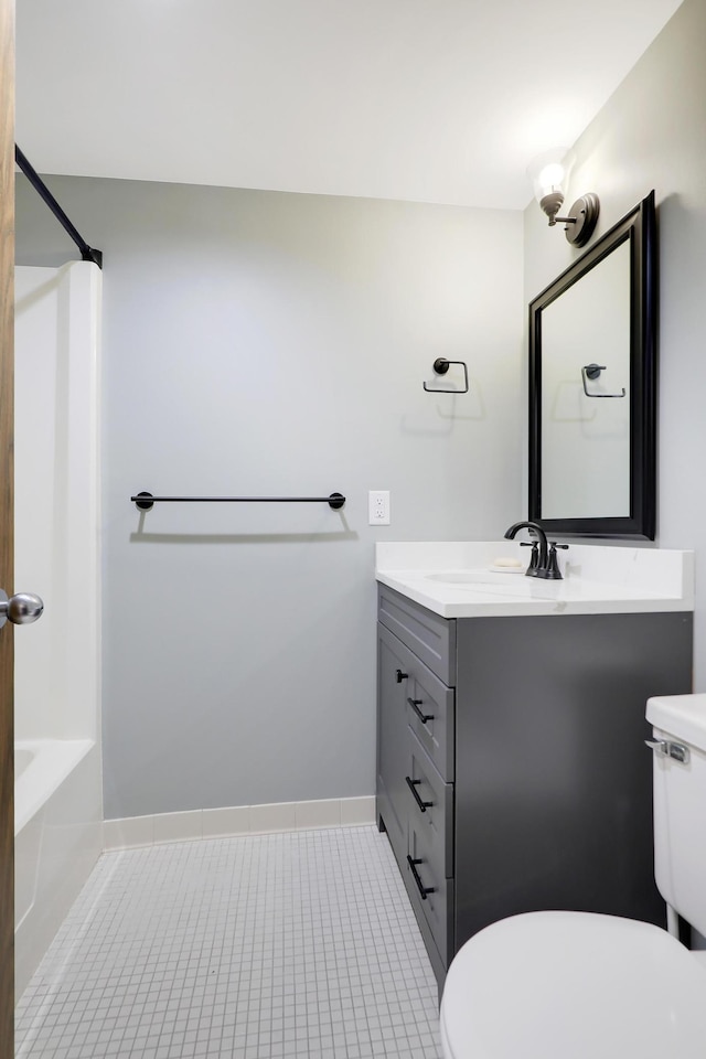 full bathroom with vanity, shower / bath combination, toilet, and tile patterned floors