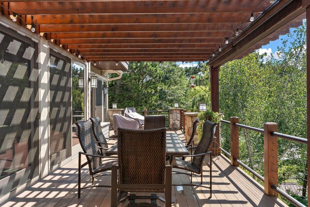 view of patio with a deck and a pergola