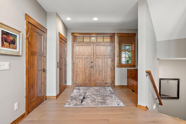 foyer featuring light wood-type flooring