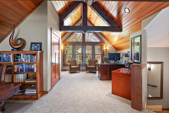 home office with beamed ceiling, high vaulted ceiling, light carpet, and wooden ceiling