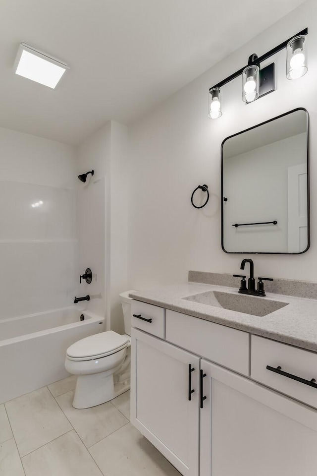 full bathroom featuring tile patterned floors, shower / washtub combination, vanity, and toilet