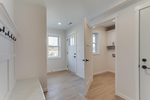 entrance foyer with light hardwood / wood-style floors