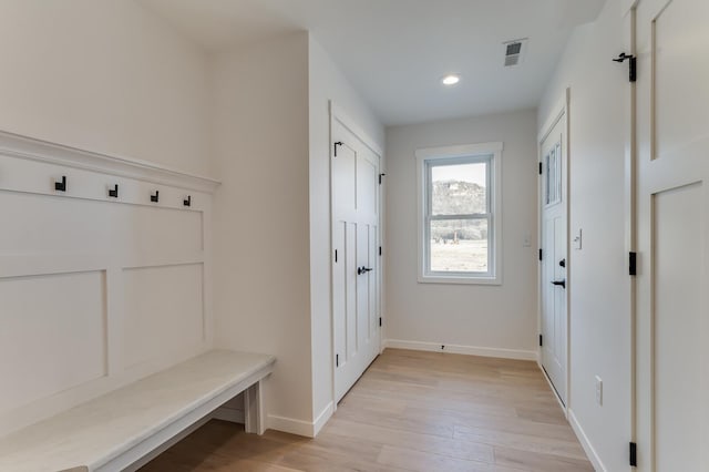 mudroom with light wood-type flooring