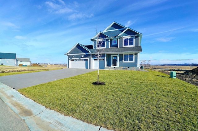 craftsman-style house with a front lawn