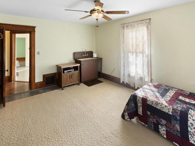 bedroom with carpet floors and ceiling fan