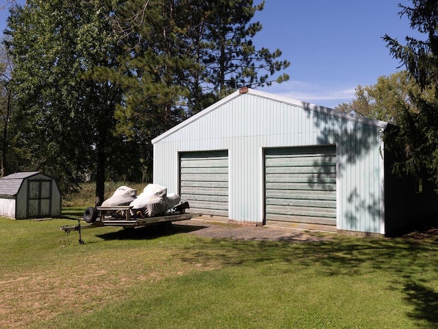 garage with a lawn