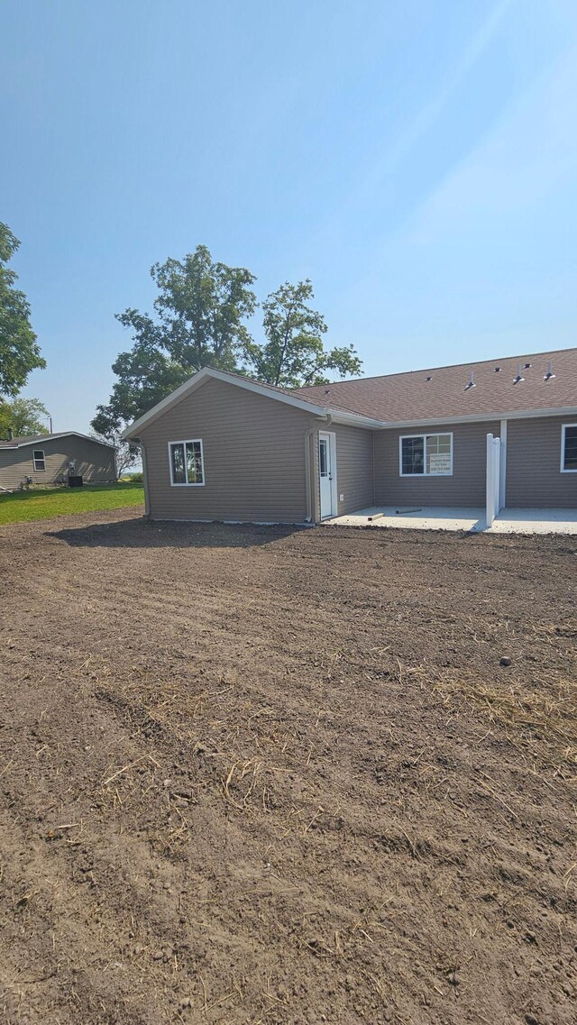 rear view of property with a patio