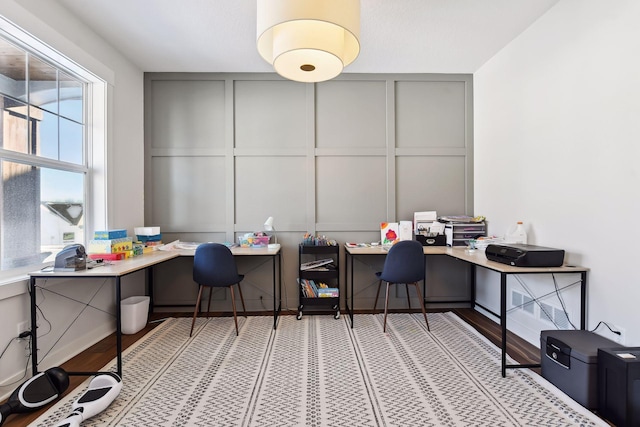 office space with light hardwood / wood-style floors