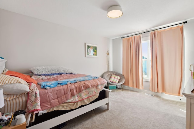 bedroom featuring carpet flooring