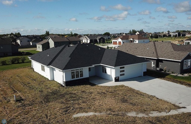 drone / aerial view with a residential view