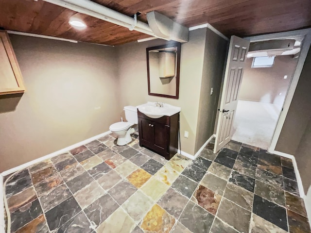 bathroom featuring vanity, toilet, and wooden ceiling