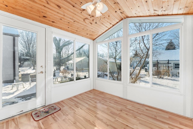 unfurnished sunroom featuring lofted ceiling, ceiling fan, and wooden ceiling