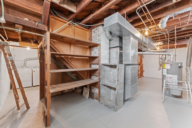 basement with washer and dryer and gas water heater