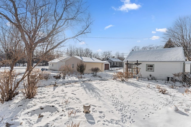 view of snow covered property