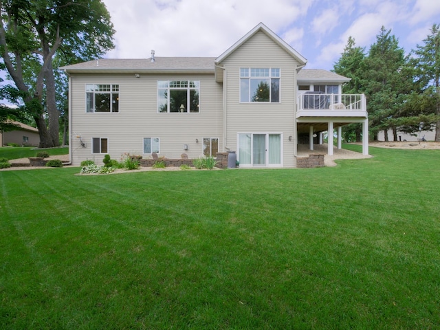 4424 Donway Dr NE, Alexandria, MN 56308 - back of property featuring a yard and a wooden deck
