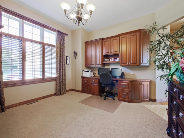 4424 Donway Dr NE, Alexandria, MN 56308 - office area with a chandelier, light colored carpet, and built in desk