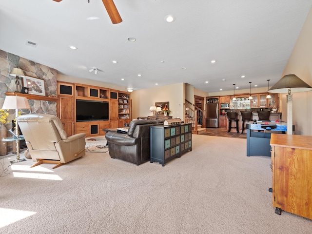 4424 Donway Dr NE, Alexandria, MN 56308 - living room featuring light carpet, ceiling fan, and recessed lighting