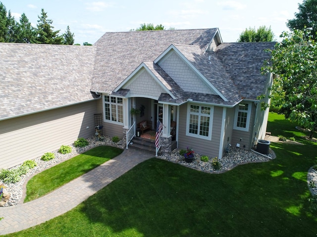4424 Donway Dr NE, Alexandria, MN 56308 - view of front of home with a front yard, a porch, and roof with shingles