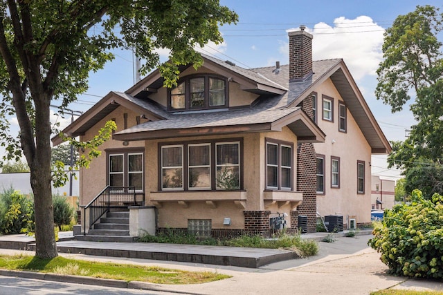 view of front of home with central AC