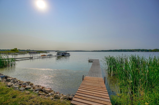 view of dock with a water view