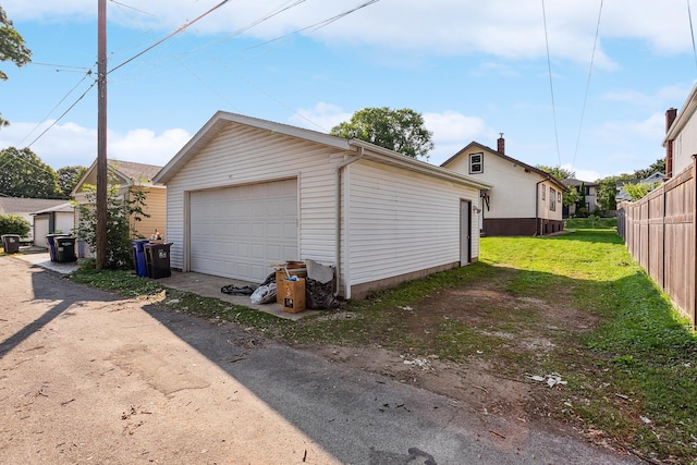 garage with a lawn