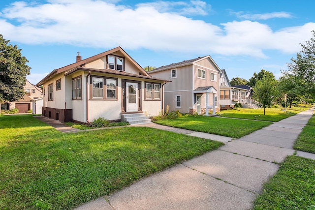 view of front of property with a front yard