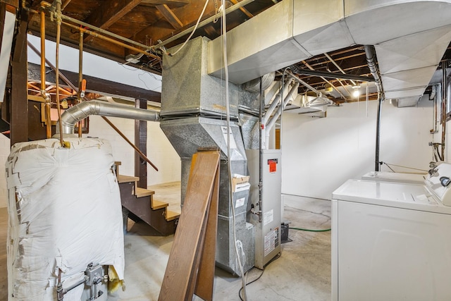 basement with separate washer and dryer