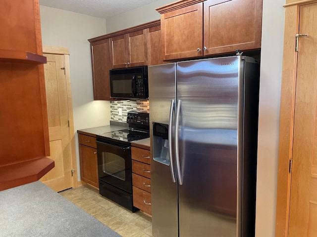 kitchen featuring tasteful backsplash and black appliances