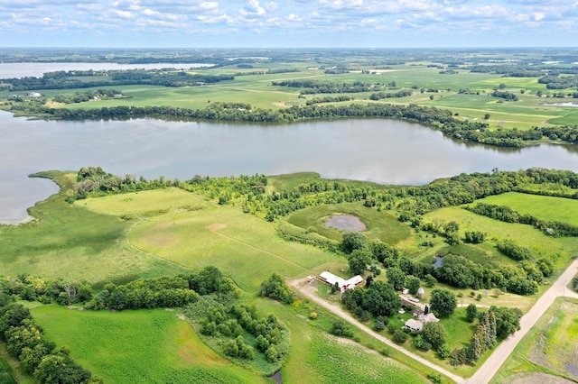 drone / aerial view featuring a water view and a rural view