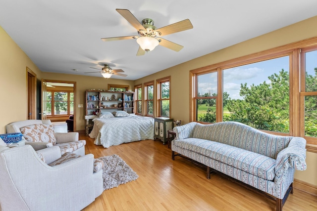 bedroom featuring light hardwood / wood-style flooring and ceiling fan