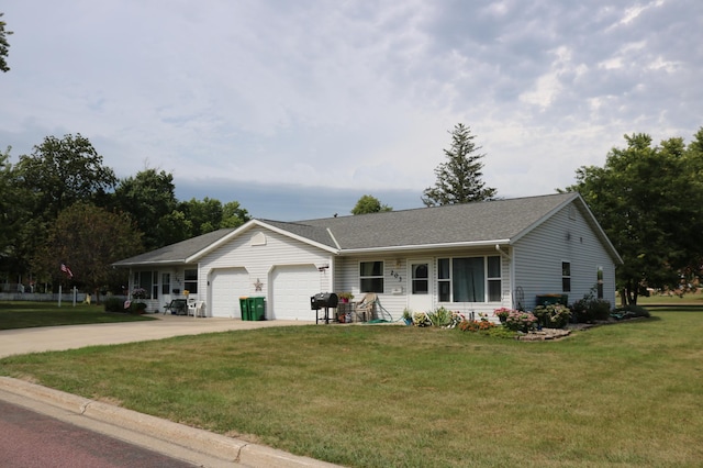 ranch-style home with a front yard, a shingled roof, a garage, and driveway